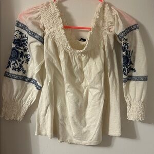 American Eagle Outfitters Cream Top with Blue Embroidery